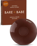 Sensitive Adhesive Nipple Covers in Mocha: a round sticky silicone cover marked Sticky, with its adhesive-free center ring visible, in front of the Mocha Bare Babe box in medical-grade silicone.
