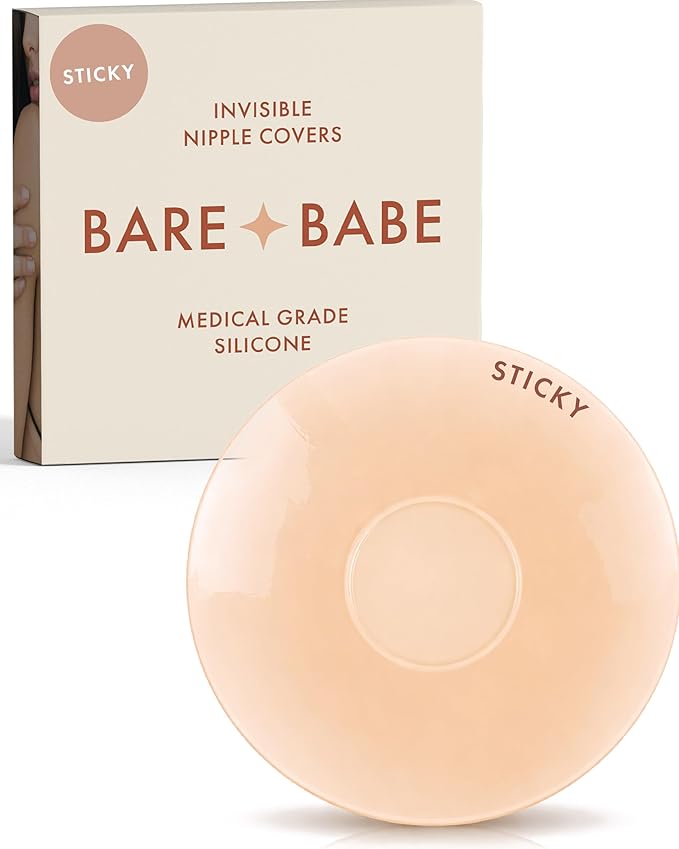 Sensitive Adhesive Nipple Covers in Creme: a round sticky silicone cover marked Sticky, with its adhesive-free center ring visible, in front of the Creme Bare Babe box in medical-grade silicone.