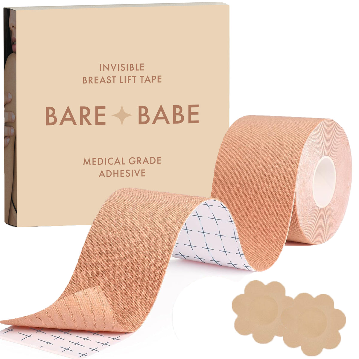 Boob Tape Kit: a roll of boob tape unrolled to show the cross-grid backing for cutting even strips, with two flower-shaped nipple pasties and the box marked invisible breast lift tape, medical-grade adhesive.