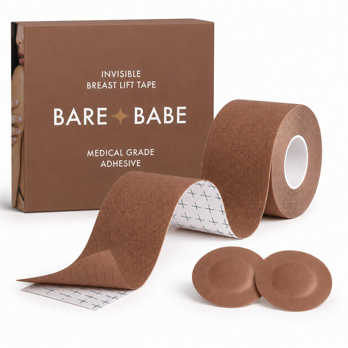 Boob Tape Kit in Cocoa: a roll of brown boob tape with grid backing for cutting strips, two matching round satin pasties to cover the nipple first, and the Cocoa box marked medical-grade adhesive.