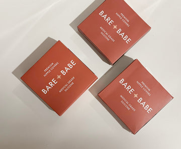 Three Bare Babe nipple cover boxes in terracotta, labeled premium nipple covers and medical-grade silicone, laid on a white surface, reusable silicone nipple covers to wear instead of a bra