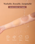 Non-Adhesive Nipple Covers, washable, sustainable and reusable over 100 times: water pours over silicone covers resting on a forearm, with care steps to wash, air dry, store in the travel bag and reuse.
