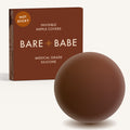 Non-Adhesive Nipple Covers in Mocha: a round, matte, grippy silicone nipple cover in front of the Mocha Bare Babe box marked Not Sticky and medical-grade silicone, reusable with no adhesive.