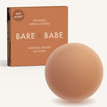 Non-Adhesive Nipple Covers in Caramel: a round, matte, grippy silicone nipple cover in front of the Caramel Bare Babe box marked Not Sticky and medical-grade silicone, reusable with no adhesive.