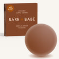 Non-Adhesive Nipple Covers in Cocoa: a round, matte, grippy silicone nipple cover in front of the Cocoa Bare Babe box marked Not Sticky and medical-grade silicone, reusable with no adhesive.