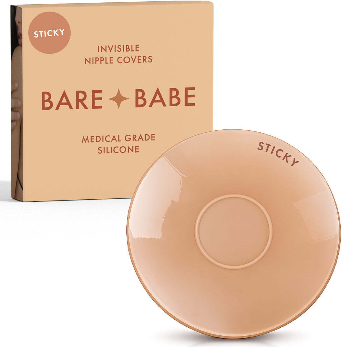 Sensitive Adhesive Nipple Covers in Honey: a round sticky silicone cover marked Sticky, with its adhesive-free center ring visible, in front of the Honey Bare Babe box in medical-grade silicone.