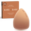 Triangle Non-Adhesive Nipple Covers in Caramel: grippy, not sticky triangle silicone nipple cover marked Not Sticky, in front of its Caramel Bare Babe box, invisible nipple covers in medical grade silicone