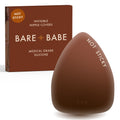Triangle Non-Adhesive Nipple Covers in Mocha: grippy, not sticky triangle silicone nipple cover marked Not Sticky, in front of its Mocha Bare Babe box, invisible nipple covers in medical grade silicone