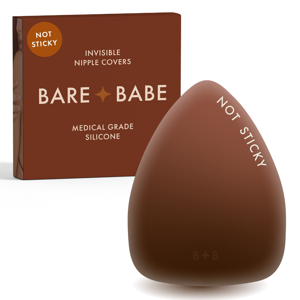 Triangle Non-Adhesive Nipple Covers in Mocha: grippy, not sticky triangle silicone nipple cover marked Not Sticky, in front of its Mocha Bare Babe box, invisible nipple covers in medical grade silicone